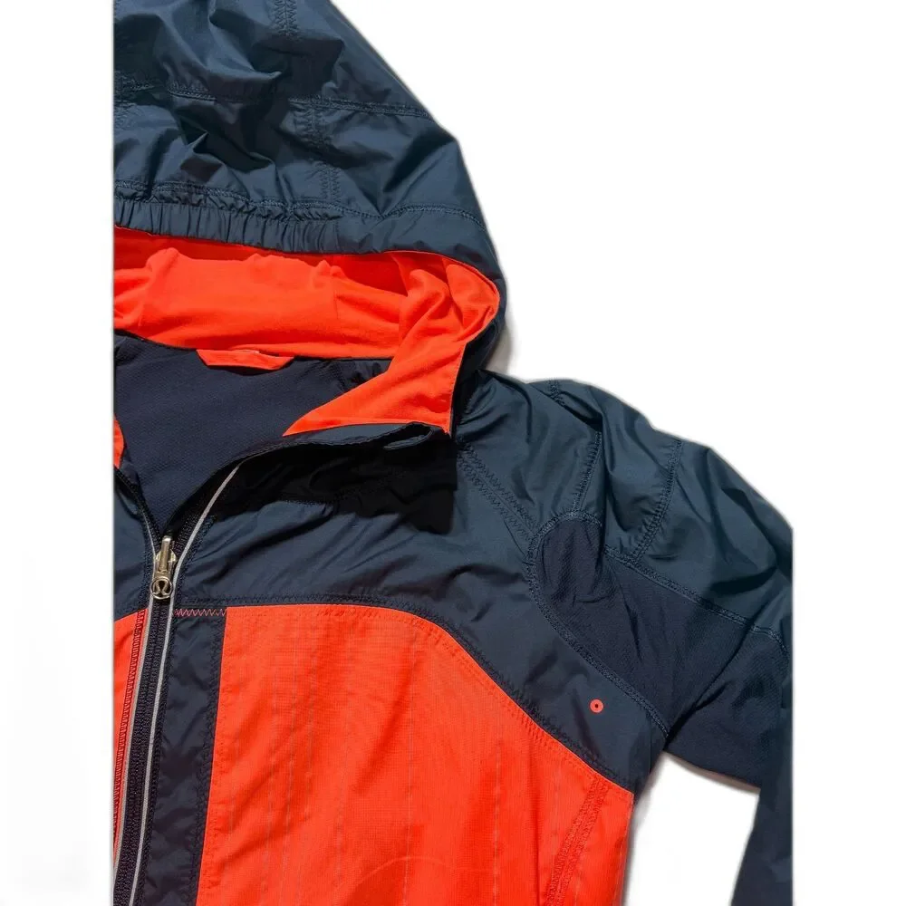 lululemon Get Up & Glow Jacket 4 Orange Navy Reflective Ponytail Hood